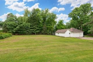 yard, looking toward garage with work room