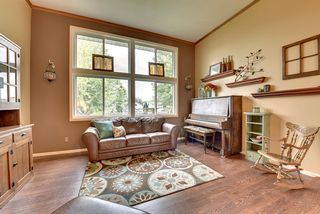 Newly refinished hardwood floors and impressive windows.