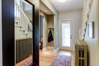 Front entryway give view from front to back with refinished hardwood floors