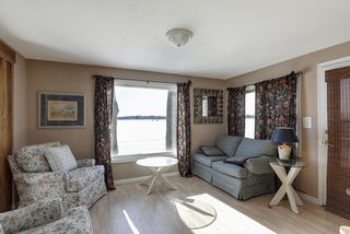 Boat house living room with beautiful views of Phelps bay