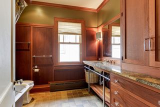 4349 Aldrich main floor bath is a combination of beautiful mahogany wood and murano glass tiles.