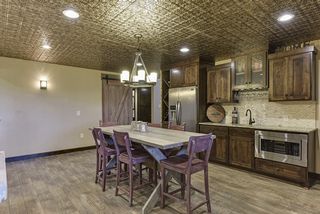 The sliding barn door, the flooring, ceiling, it all plays so well together