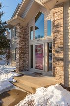 Vaulted front entrance - glass to second story