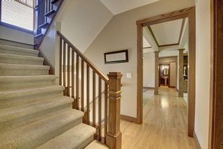 Wide, open stairway - natural light abounds from the large south facing window.