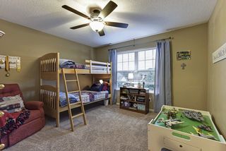 Bedroom 4 on the upper level with views of the front yard