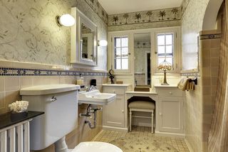 The 2nd Floor Full Bathroom features AMAZING Original Details with Unique Tile...