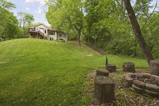 The backyard has a long sweeping lawn great for winter sledding