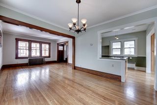 The dining room opens up to the renovated kitchen.