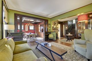 Another view of the Living Room with loads of Original Woodwork! 