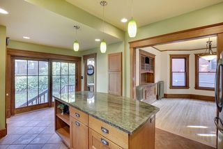 The Kitchen features this beautiful Center Island with Pendant Lighting.