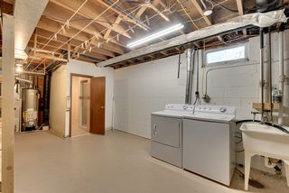Washer/dryer, utility tub set up.