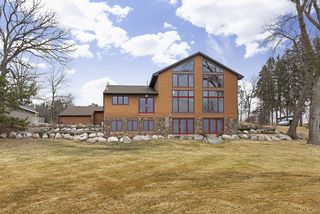 A gradual sloping yard to the lake provides many options for entertaining and gathering.