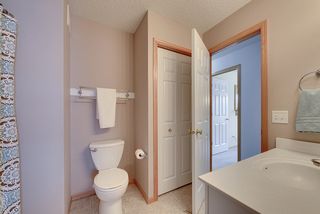 Spacious upper level bathroom with even more storage space
