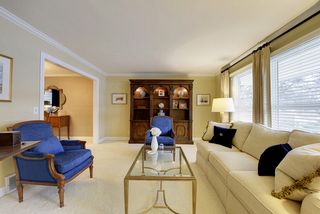 Custom wood blinds and draperies included!