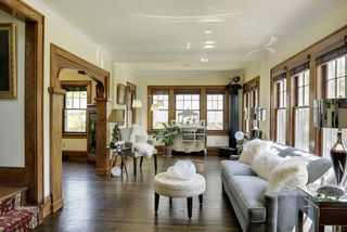 The Light-Filled Living Room features walls of Windows!