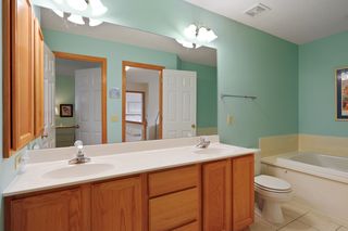 Main bath with double vanity and seperate tub.