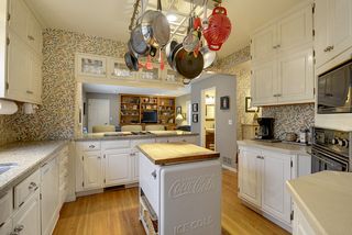 The Kitchen features LOADS of Cabinets! 
