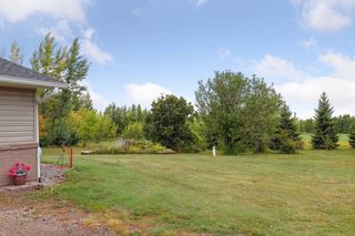 Property features multiple flower gardens