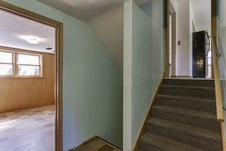 Walk-out level with second bathroom, den, and garage easily accessible...
