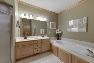 Master bath with double sinks, separate tub and shower...