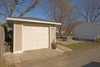 One-Car Detached Garage with New Garage Door