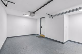 If I didn't tell you this was a garage you might think it's a flex space workout room or finished shop