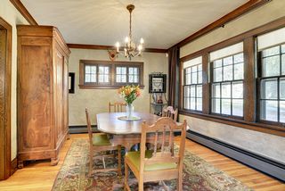 The Dining Room features Piano Style Windows & Hardwood Floors...