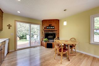 Wood burning fireplace in the kitchen/dining area brings a nice element to any meal