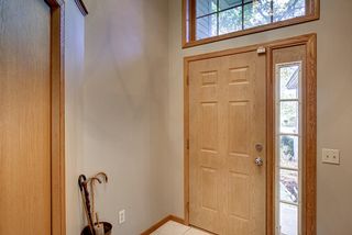Large foyer with front closet and 13 ft. ceilings. 