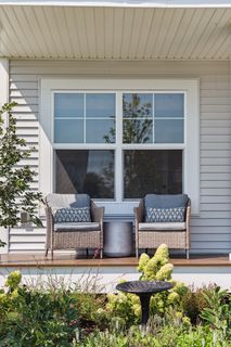 This is a cute porch to get to know your neighbor or simply enjoy a good book.