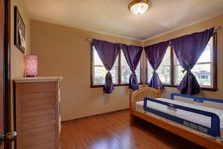 Beautiful hardwood floors and lots of newer windows in main floor bedroom