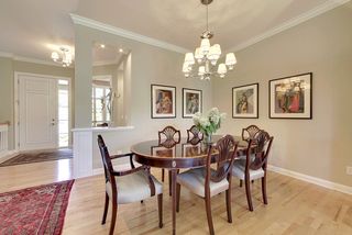 The dining room features hardwood flooring and space for any table.