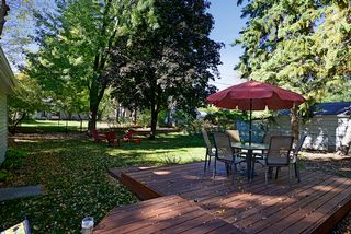 Inviting deck off the kitchen overlooking spacious fenced yard