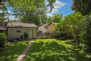 Fenced in yard & with outdoor laundry hanging space