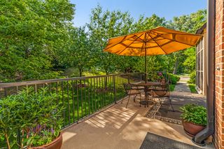This end unit Townhome has two entrances to the front door ~ one from the drivway/guest parking lot and tuckunder garage, with three separate outdoor gathering spots.