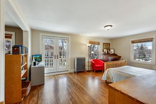 Master Bedroom with french doors to deck and adjoining room