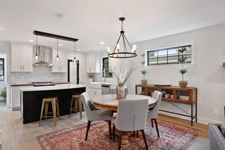 Spacious formal dining area and center island with seating