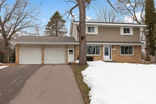 Charming 2-story home with 3 bedrooms on upper level...