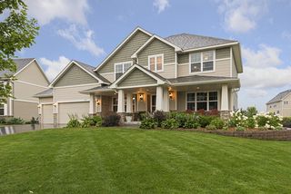 Handsome 2-story home with lush landscaping