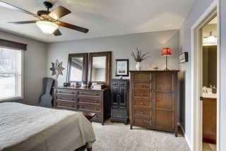 Owners Suite with Neutral Decor and Lighted Ceiling Fan