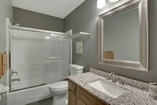 Main level bath with granite countertop...