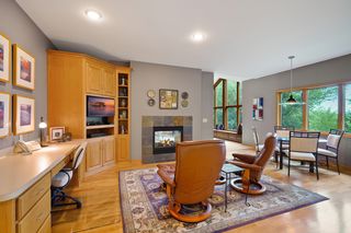 Built-in desk, media center and hearth room off the kitchen.  