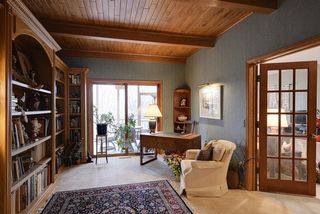 Relax with a good book in the library - or step out to the inviting porch...