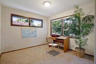 Second Bedroom has a wonderful view of the back yard and lots of storage