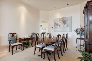 Dining room with second door to kitchen area.