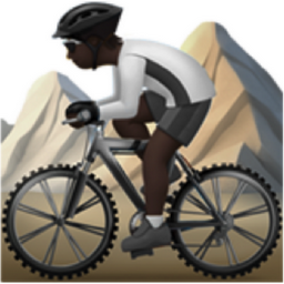 person mountain biking: dark skin tone emoji