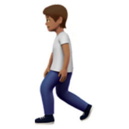 person walking: medium skin tone emoji