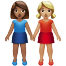 women holding hands: medium skin tone, medium-light skin tone emoji