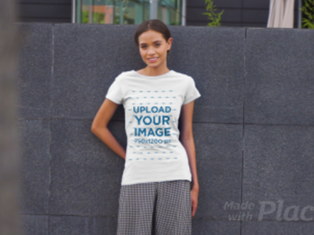 T-Shirt Video Featuring a Young Woman Posing in an Urban Scenario 3380v