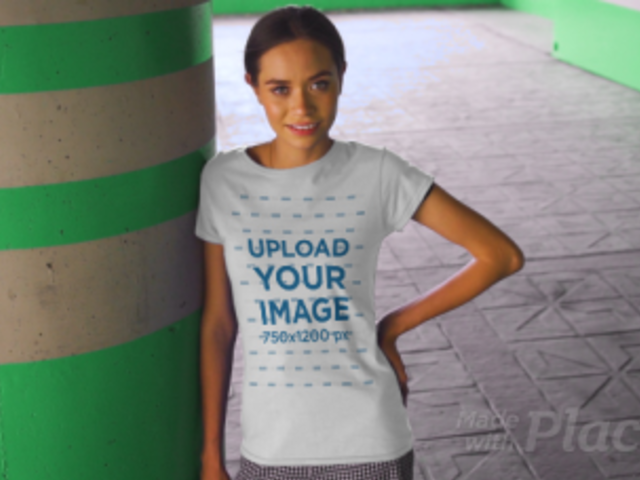T-Shirt Video of a Happy Young Woman Posing by a Concrete Column 3383v